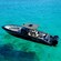 A speedboat anchored in the water